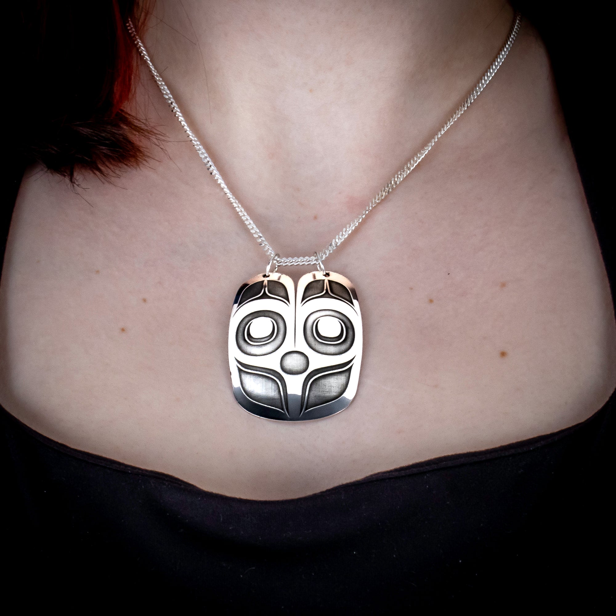 Sterling Silver Mouse Women Pendant by Canadian Handpoke tattoo artist Danika worn by a model