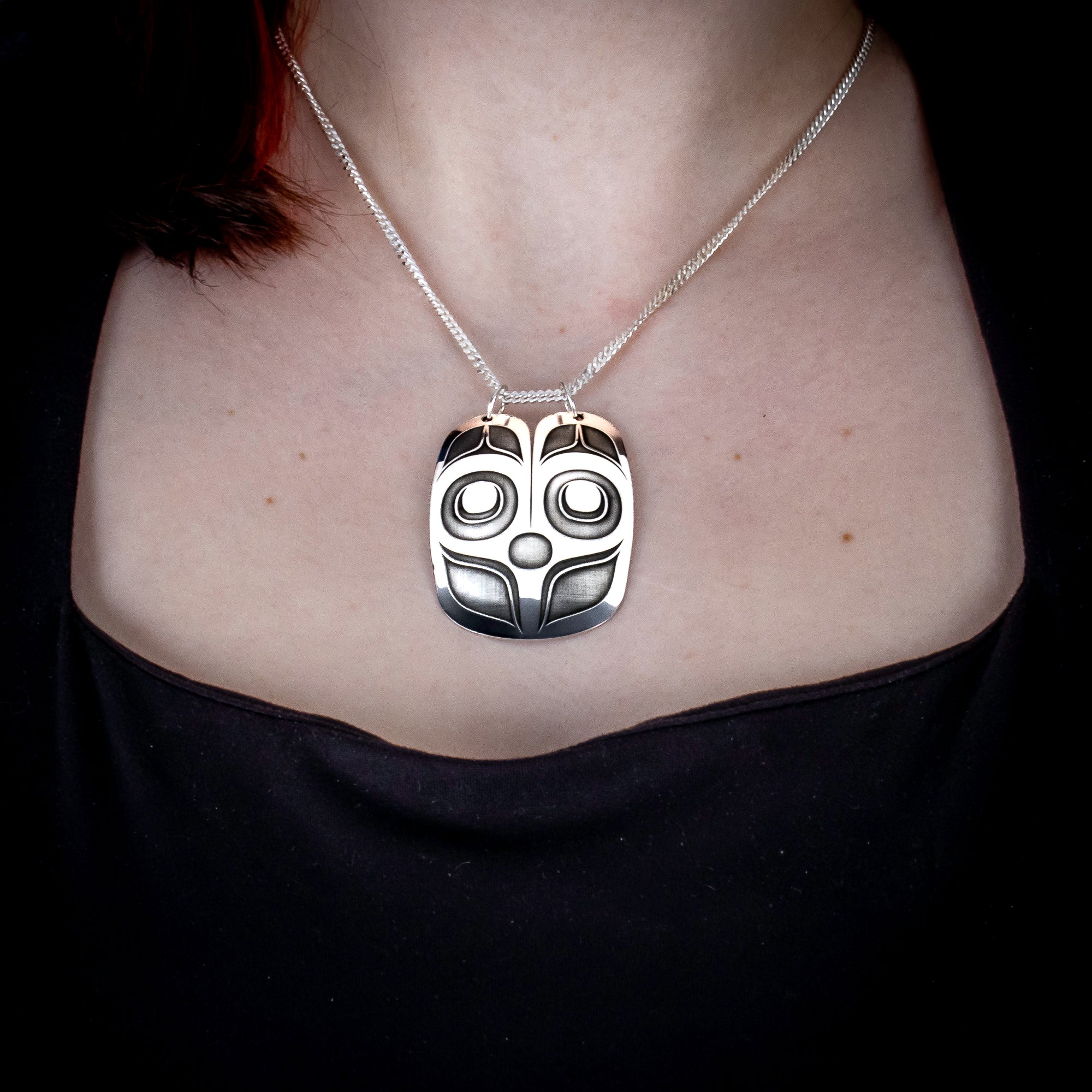 Sterling Silver Mouse Women Pendant by Canadian Handpoke tattoo artist Danika worn by a model
