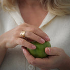 Wide 14K Gold Raven Wrap Ring by James Sawyer (Haida)