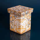Foam Woman Haida Art Bentwood Box by Danielle Louise Allard on a blue back ground with a reflective surface.