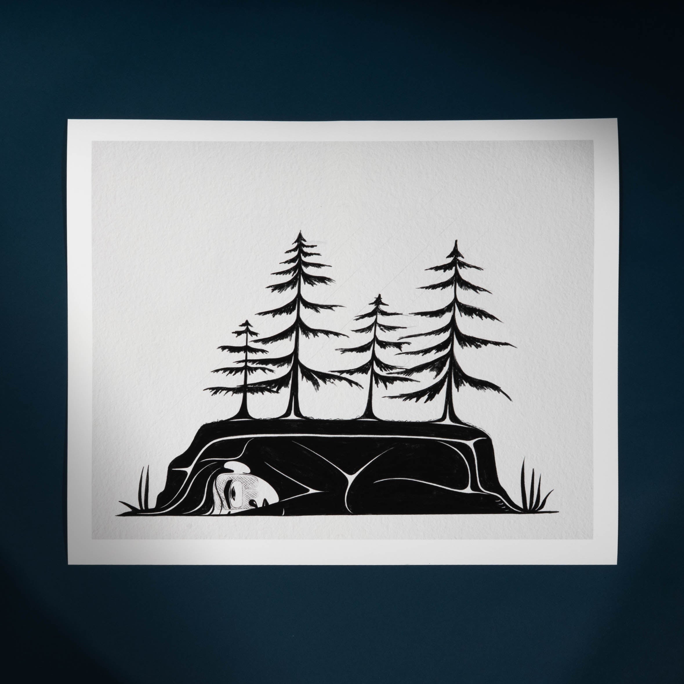 Art print with Black silhouette of a woman with trees growing from her on a white background by Haida Artist Shoshannah Greene