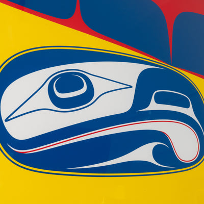 Close up Framed fine artwork with a stylized formline design featuring a blue and white abstract eagle figure with yellow and red background by renowned haida artist Robert Davidson