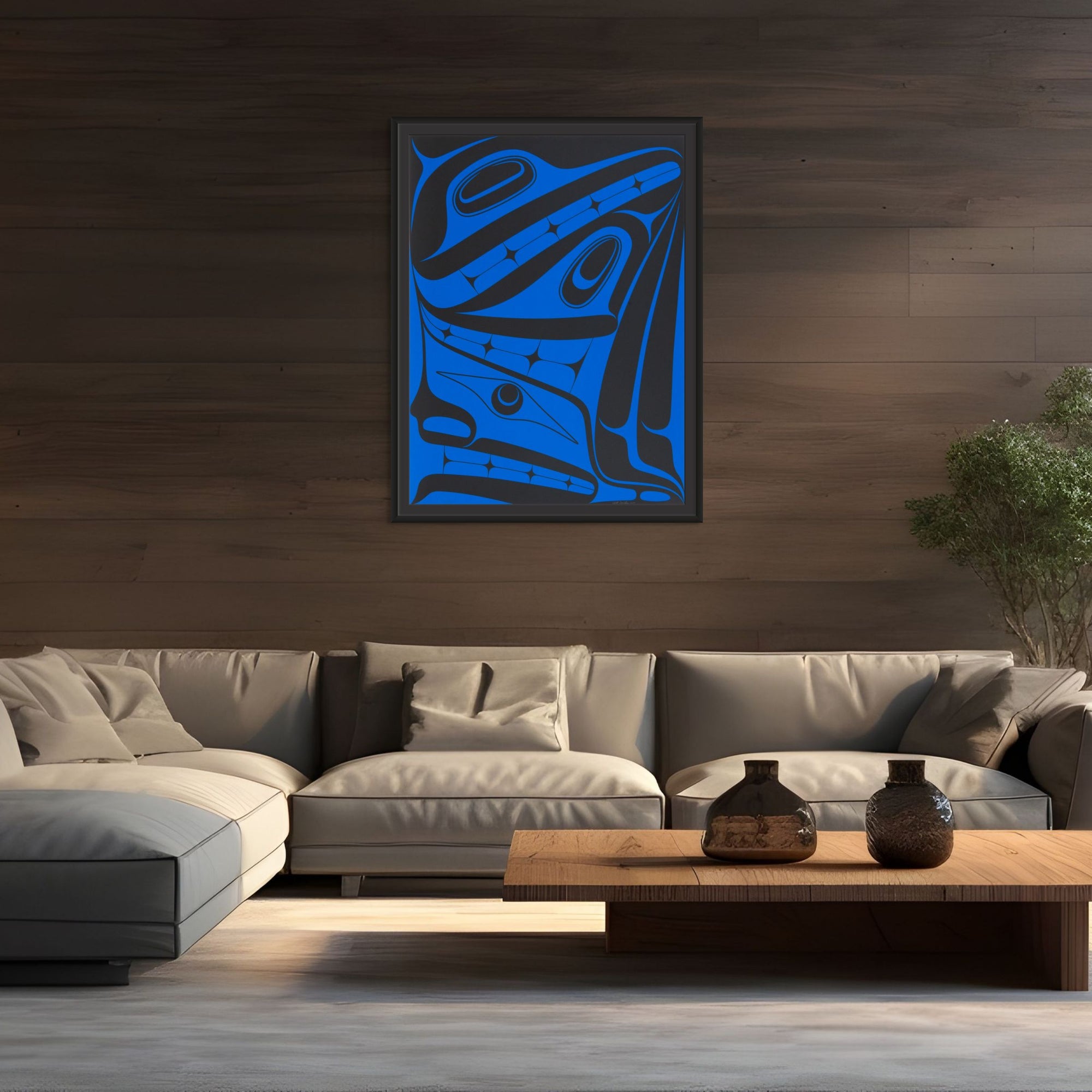 Modern living room with a gray sectional sofa, wooden coffee table, and abstract blue artwork on the wall.