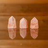 Tumbled rose quartz pyramids crystals healing metaphysical sold by Crystal Cabin.