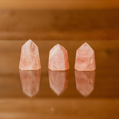 Tumbled rose quartz pyramids crystals healing metaphysical sold by Crystal Cabin.
