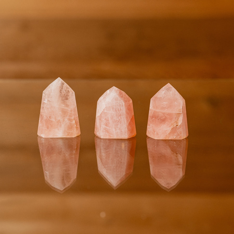 Tumbled rose quartz pyramids crystals healing metaphysical sold by Crystal Cabin.