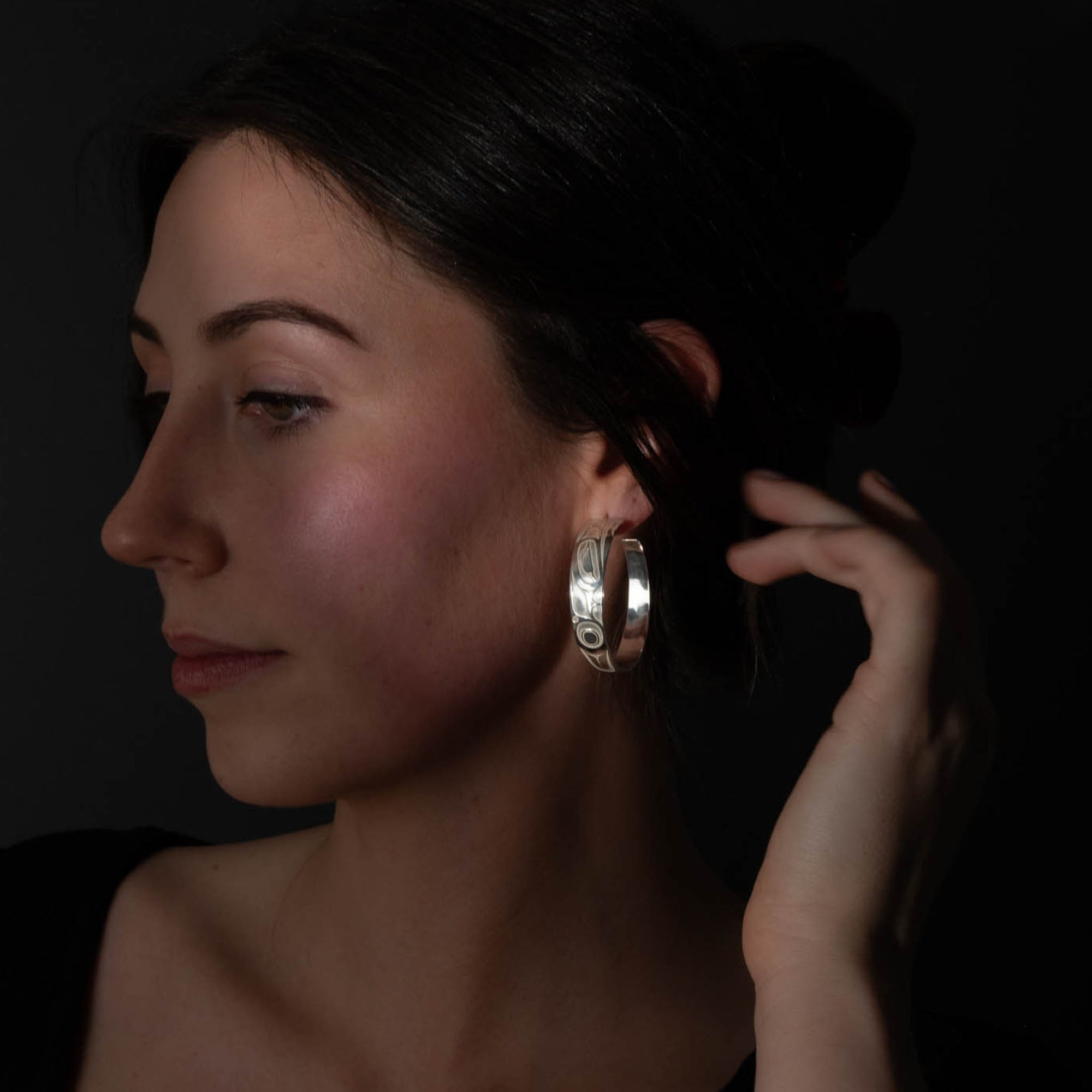 Sterling Silver Thunderbird Hoop Earrings | By Morgan Asoyuf (Ts'ymsen)