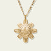 Gold sun pendant by northwest coast Indigenous jeweller Meaghan McRae