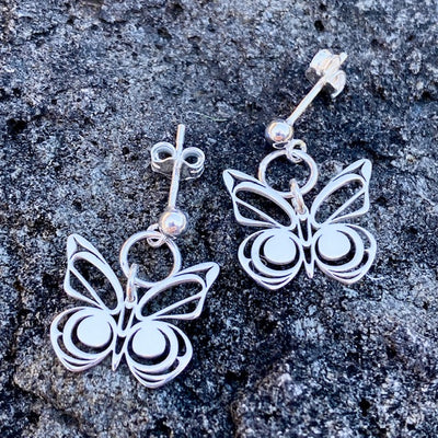 Silver Indigenous Butterfly Earrings by Morgan Asoyuf in British Columbia, Canada. Sold by Crystal Cabin.