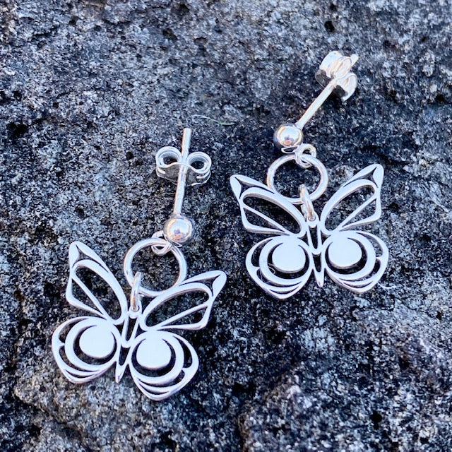 Silver Indigenous Butterfly Earrings by Morgan Asoyuf in British Columbia, Canada. Sold by Crystal Cabin.