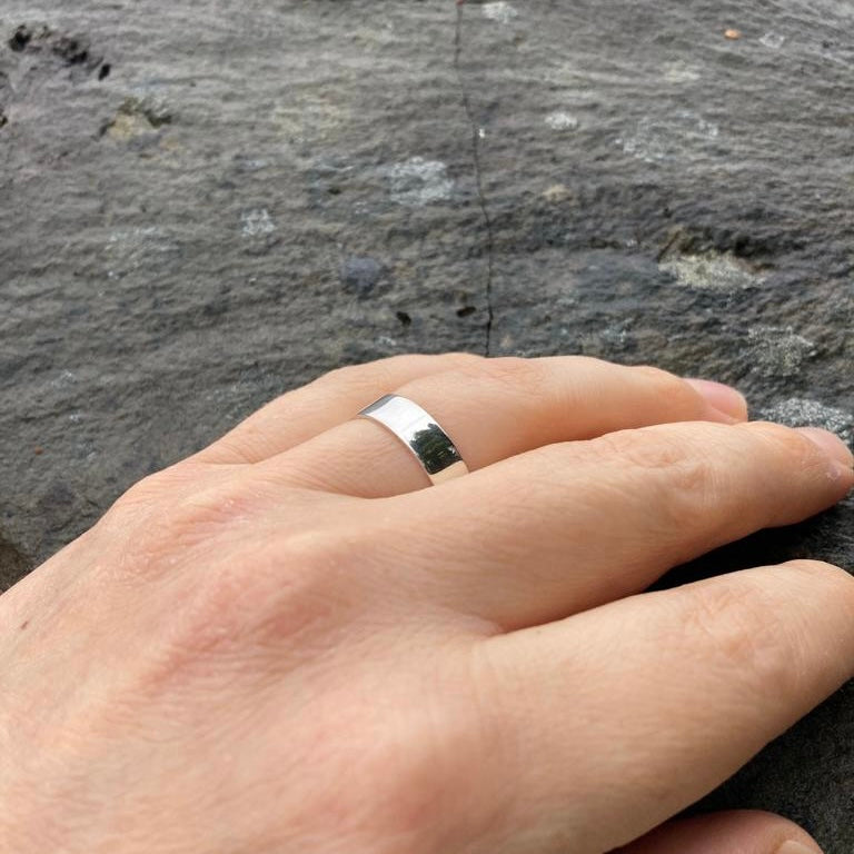 Sterling silver handmade band ring sold by Crystal Cabin Gallery