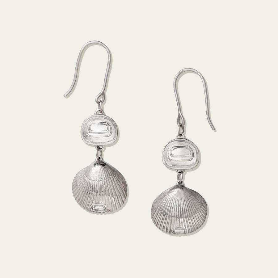 Sterling silver eyes and clamshell earrings by Indigenous artist, Morgan Asoyuf 